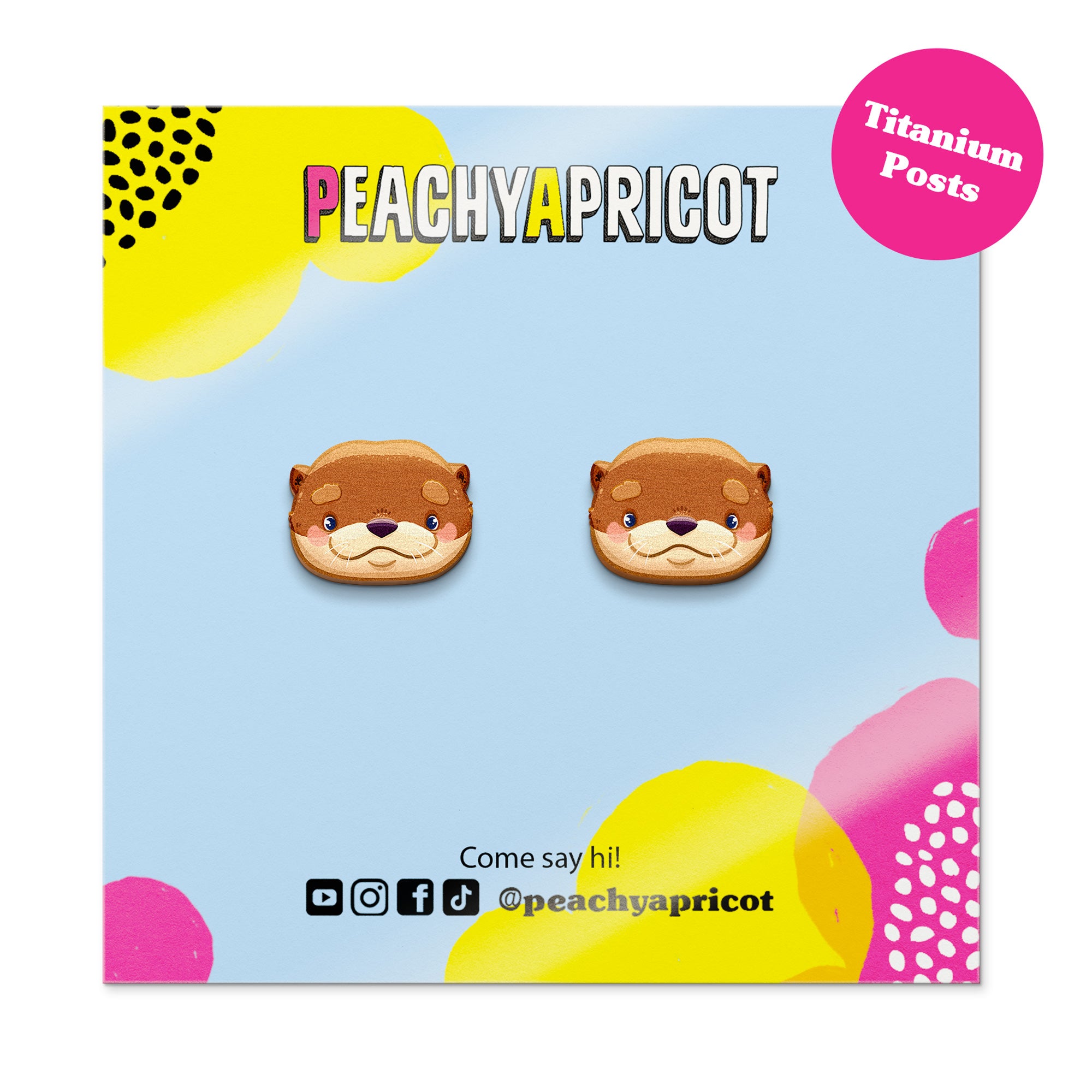 Peachy Apricot otter-shaped earrings on a colorful background with brand name and social media handles.