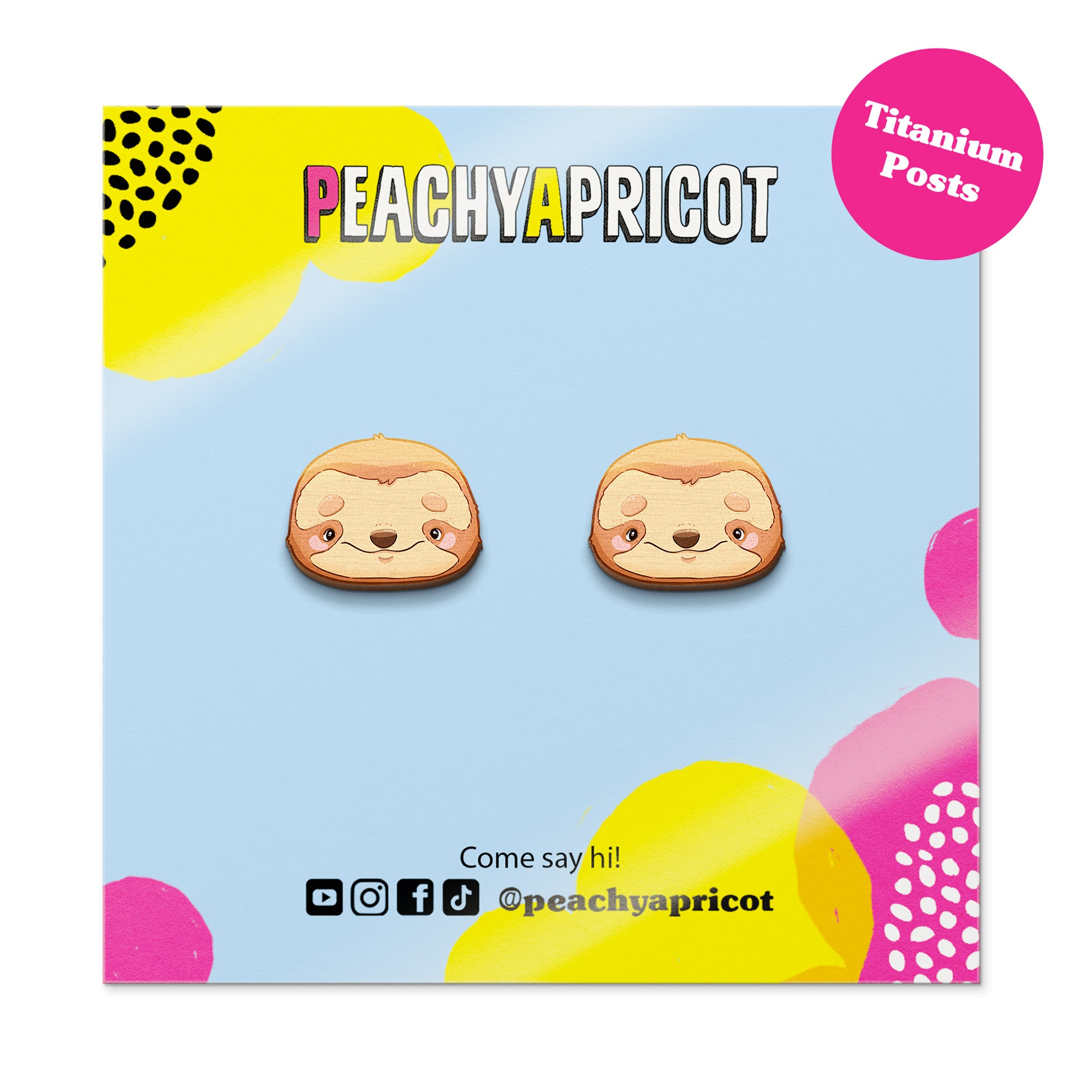 Earring packaging with cartoon dog design on a colorful background, featuring the brand 'Peachy Apricot'.